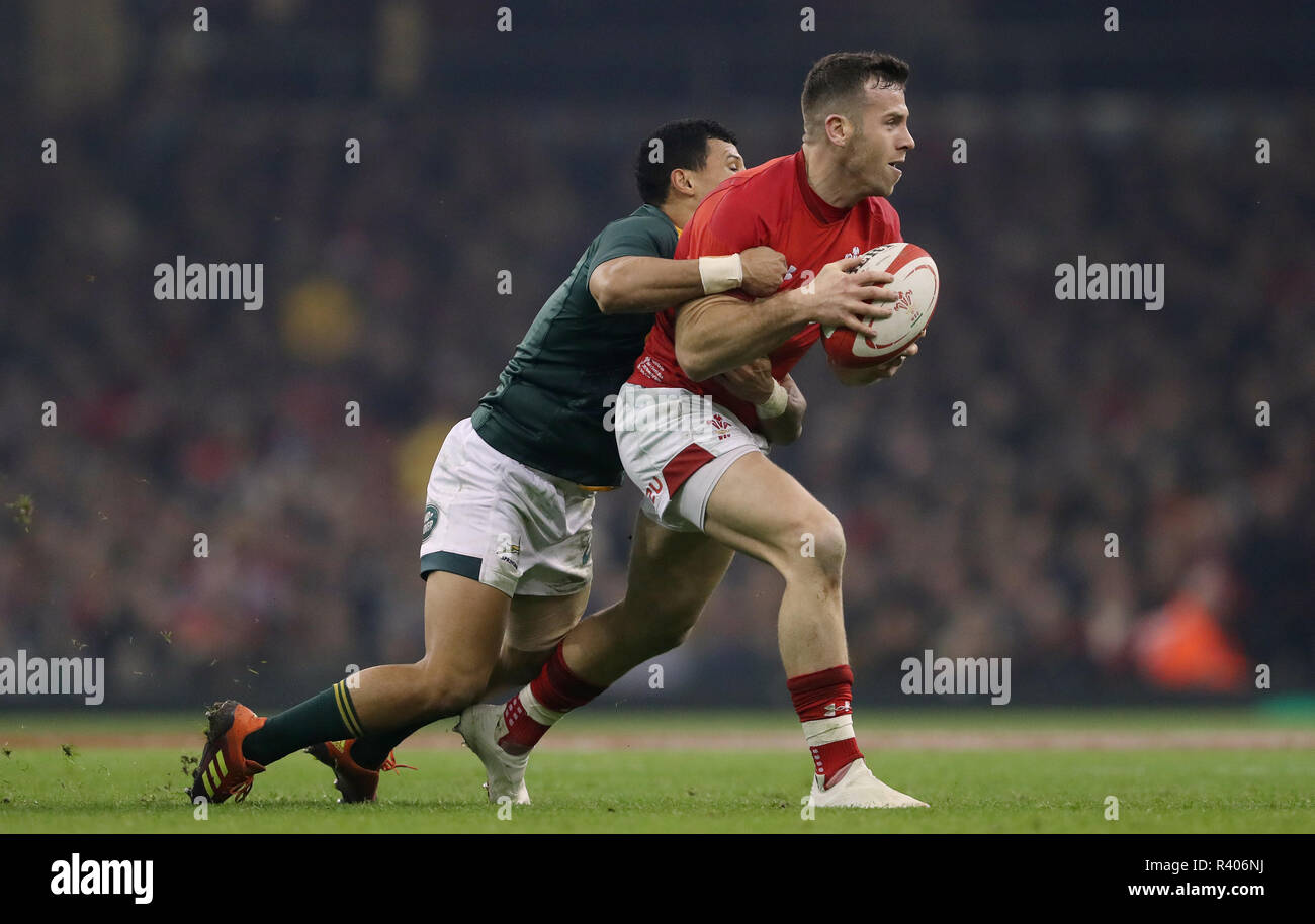 Wales Gareth Davies is tackled by South Africa's Embrose Papier during the Autumn International at The Principality Stadium, Cardiff. Stock Photo