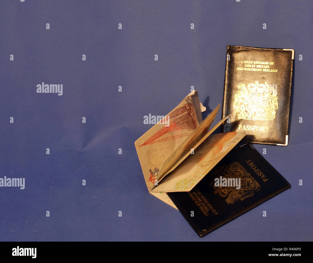 Multiple Passports. A selection of passports and holders showing pages ...