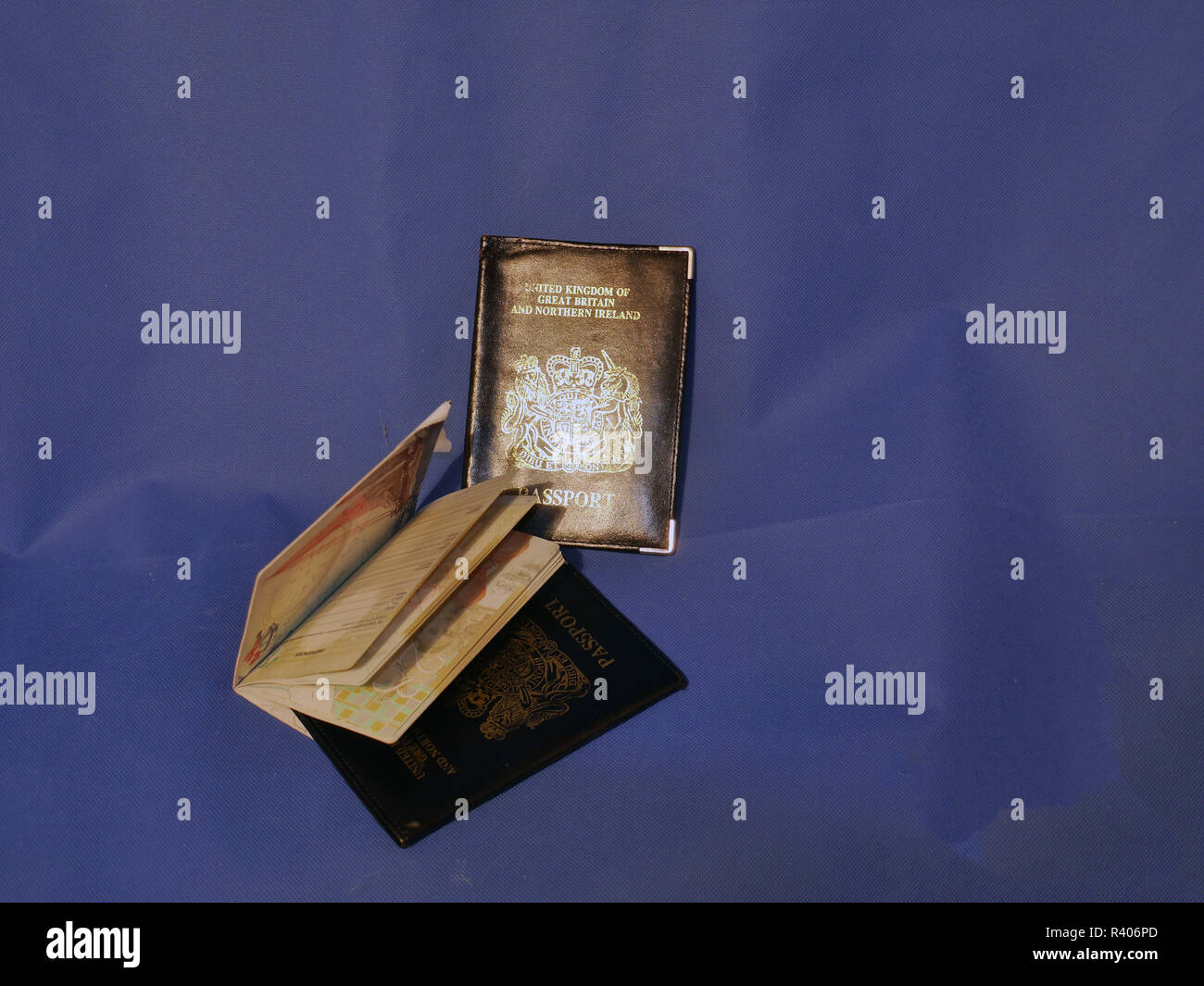 Multiple Passports. A selection of passports and holders showing pages ...