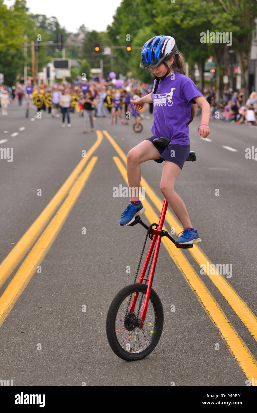 Unicycle girl hires stock photography and images Alamy