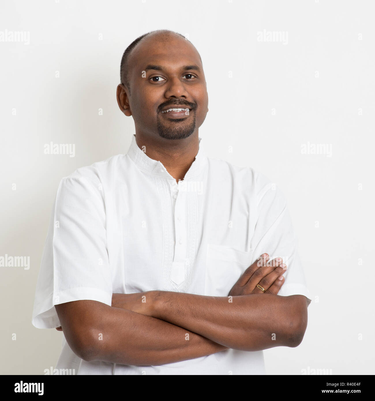 Mature casual business Indian man arms crossed Stock Photo Alamy