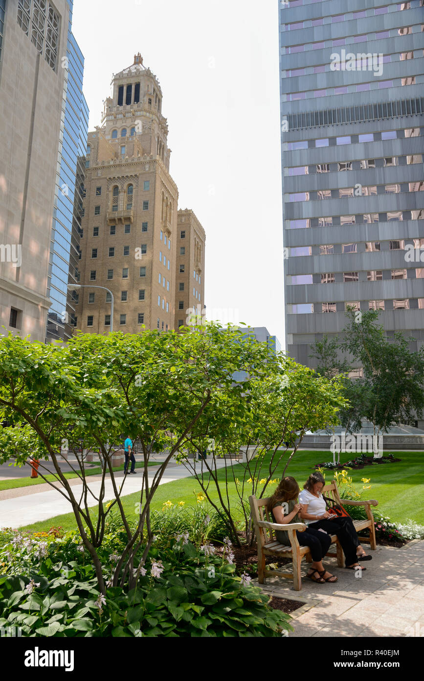 Two women on bench at main headquarters of the Mayo Clinic in Rochester