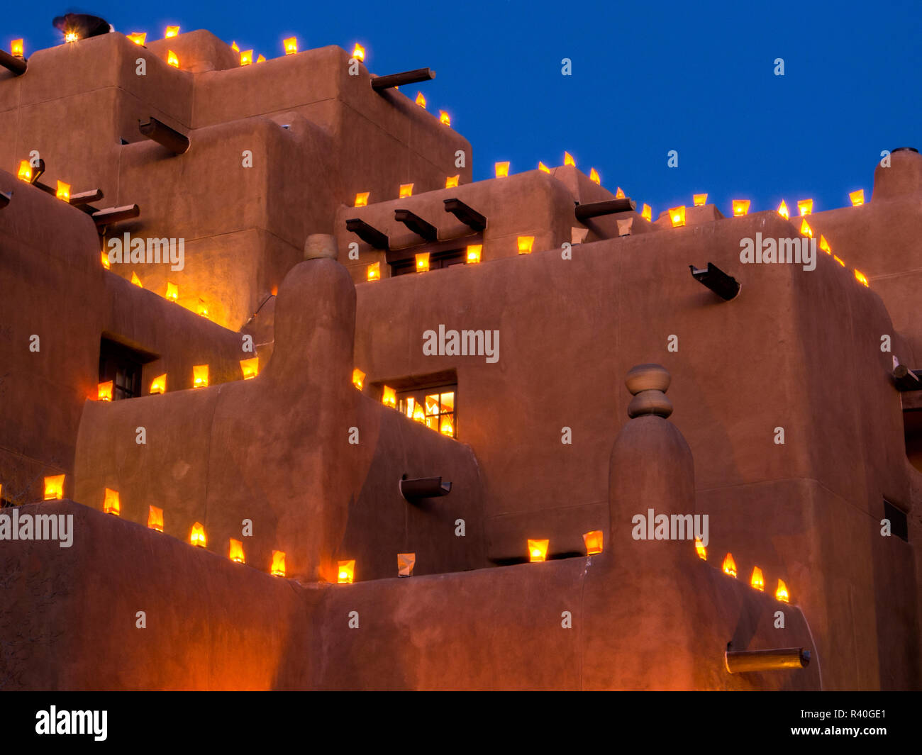 USA, New Mexico, Sant Fe, Adobe structure with protruding vigas and Soft Lights Stock Photo