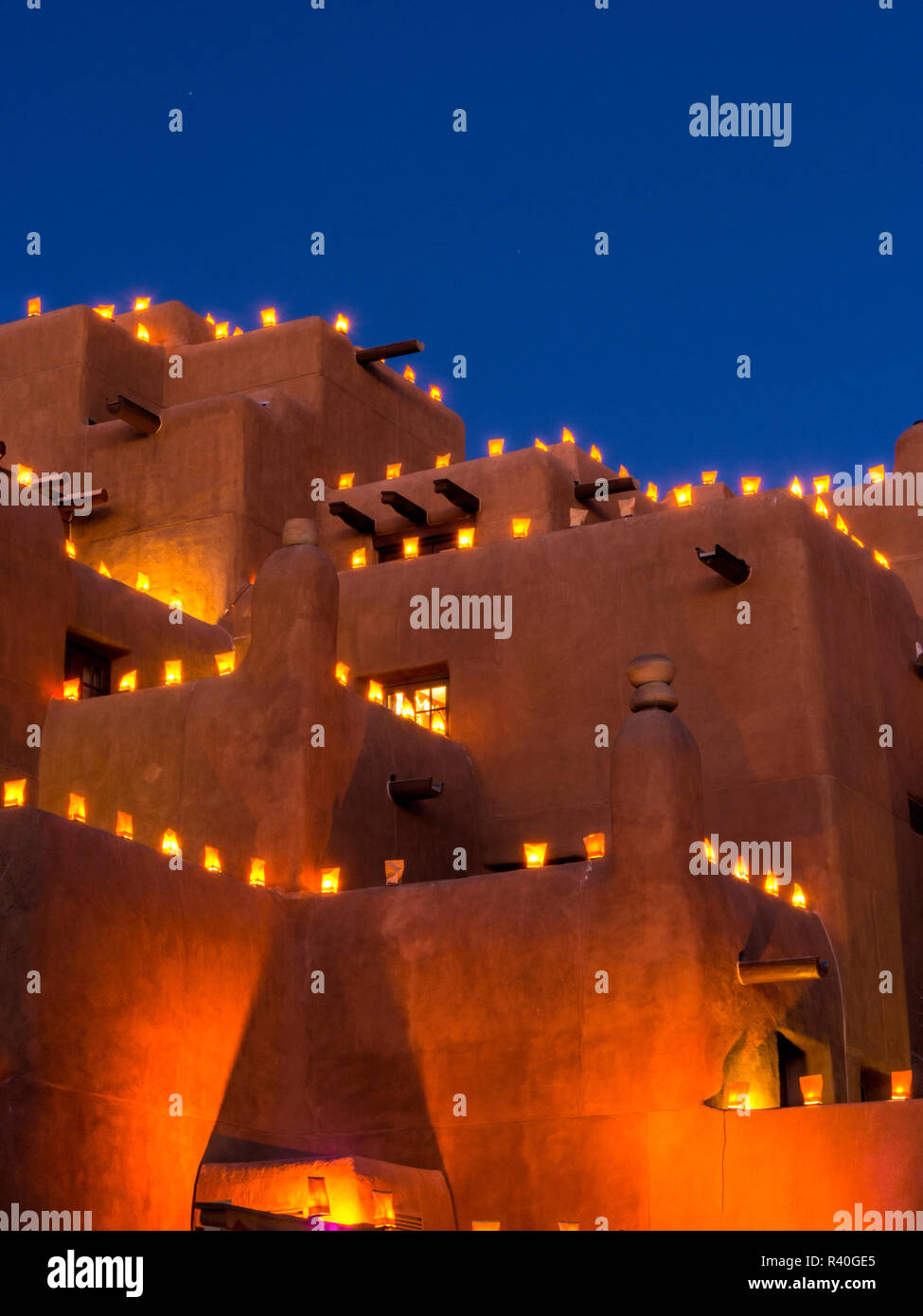 USA, New Mexico, Sant Fe, Adobe structure with protruding vigas and Soft Lights Stock Photo