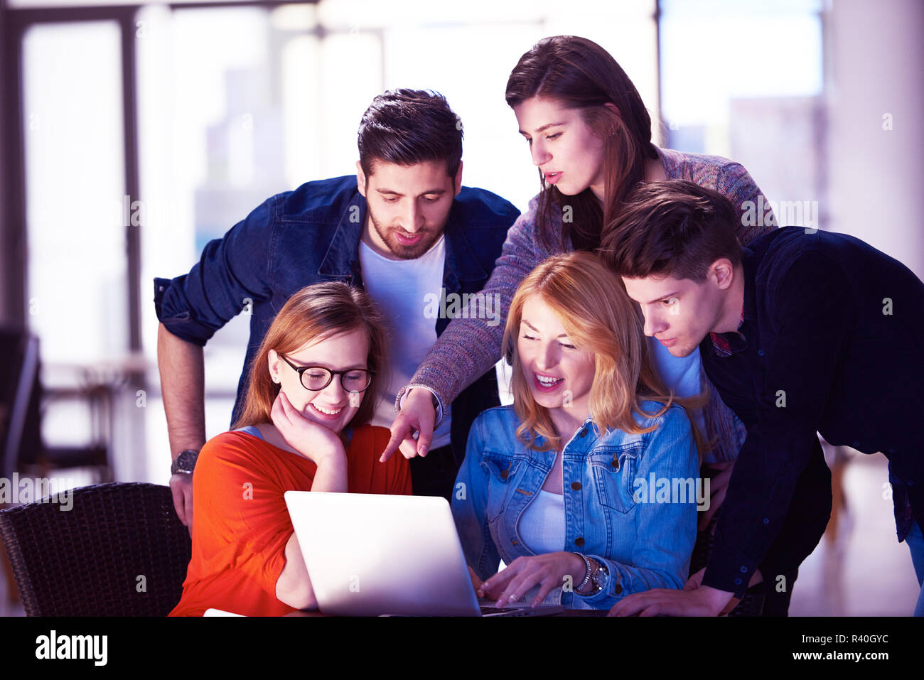 students group working on school project together Stock Photo - Alamy