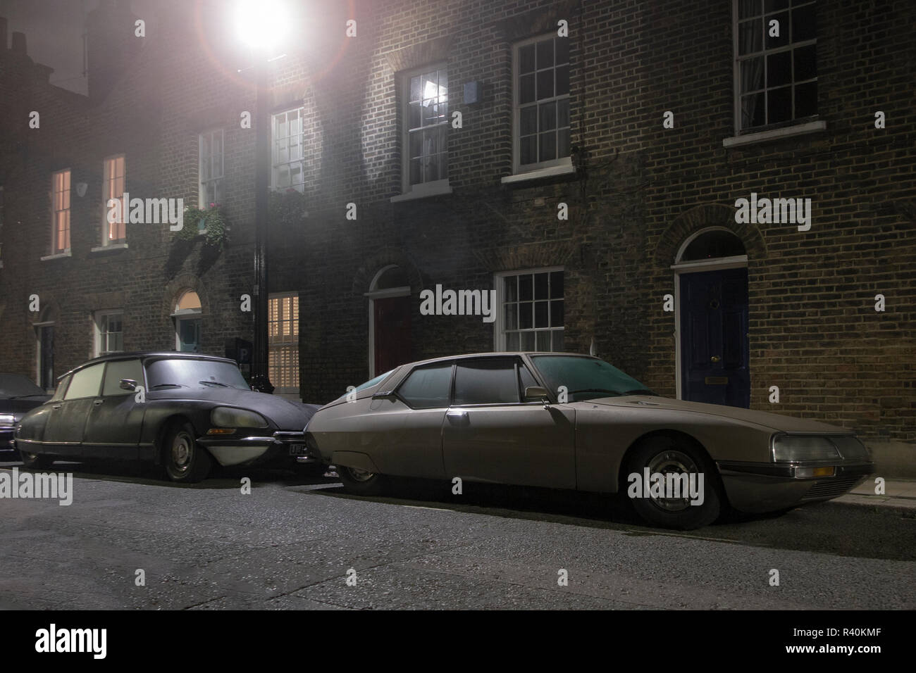 Vintage Citroens - an SM and a DS outside a house in a street in London Stock Photo