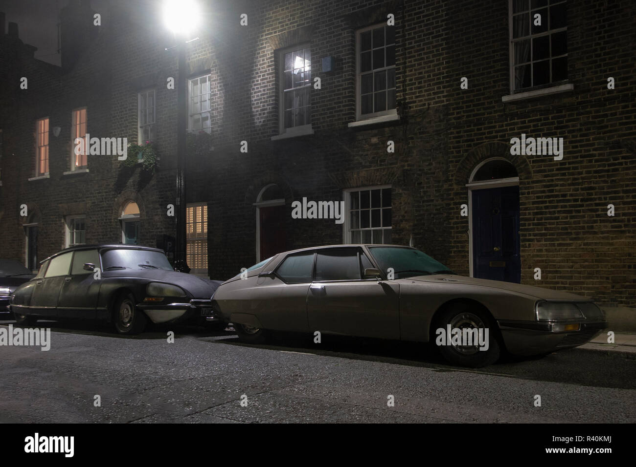 Vintage Citroens - an SM and a DS outside a house in a street in London Stock Photo
