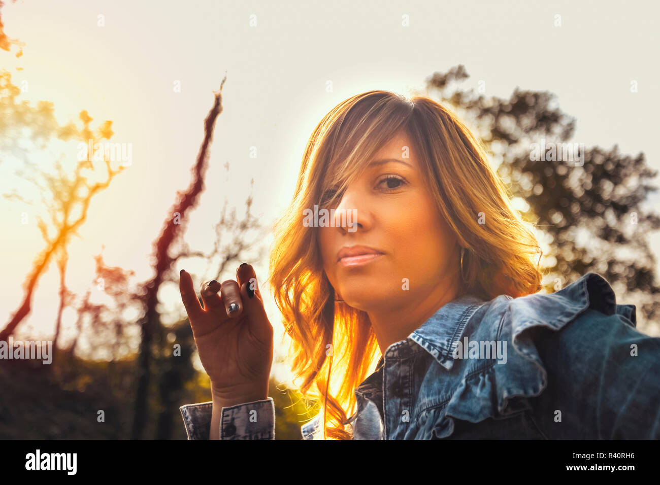 Young woman sad park hi-res stock photography and images - Alamy