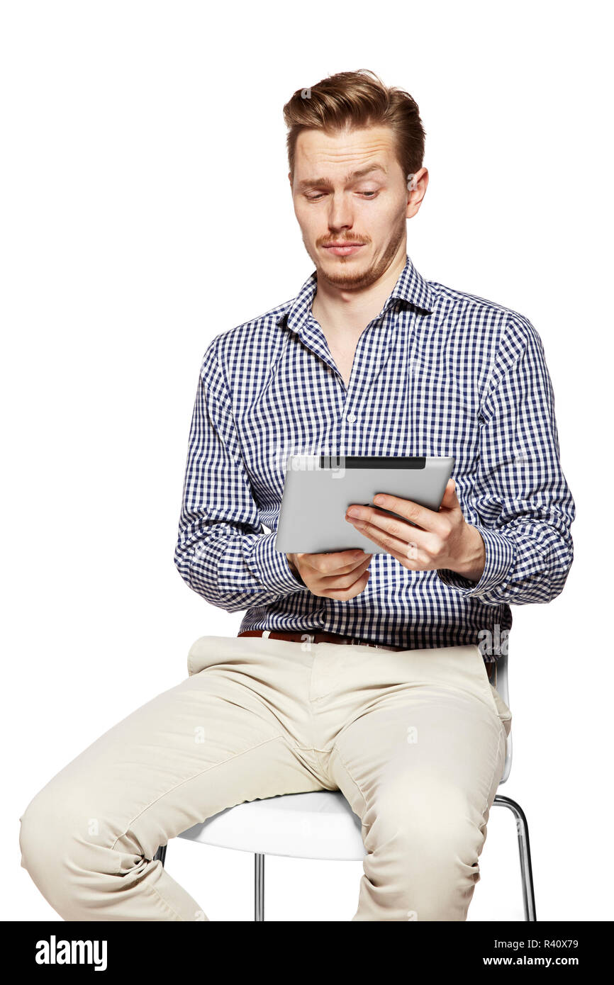 Man looks on tablet Stock Photo