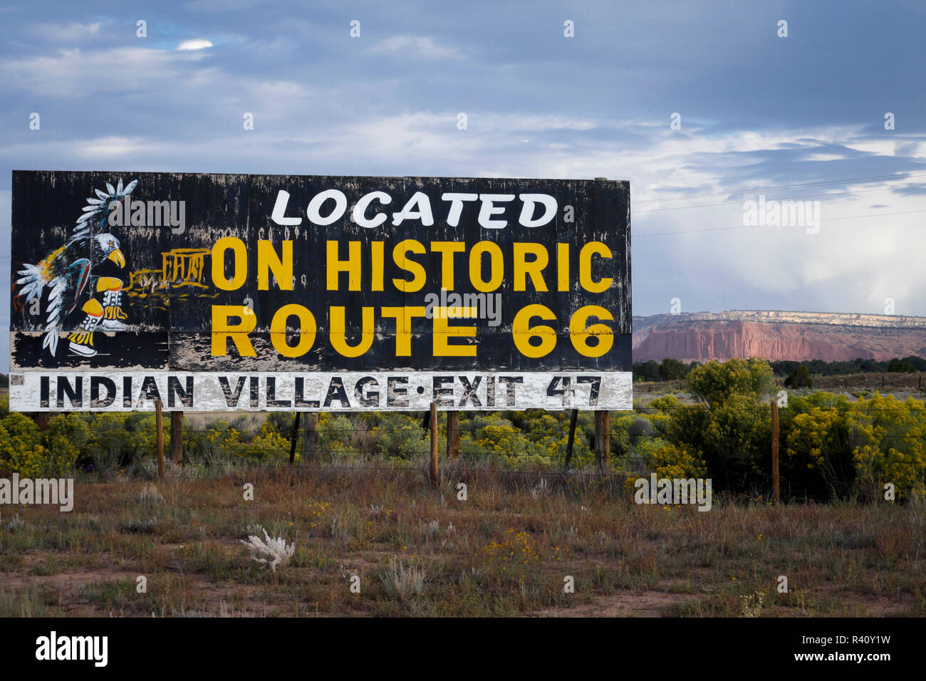 Worn sign indicating directions to an Indian Village of on Route 66