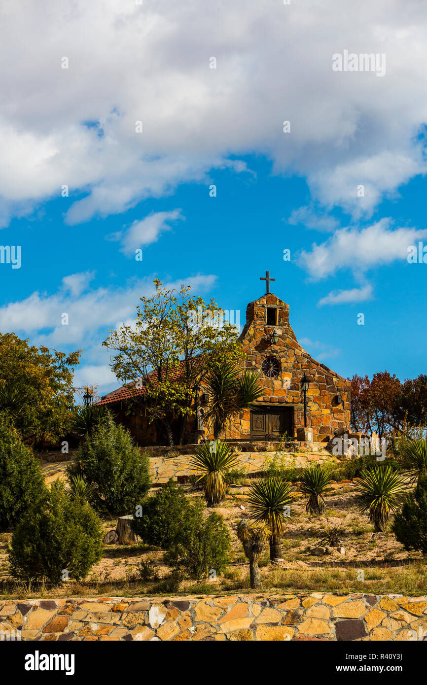 Espanola, New Mexico. High Road to Taos, Cobblestone Spanish church with autumn cottonwood trees Stock Photo