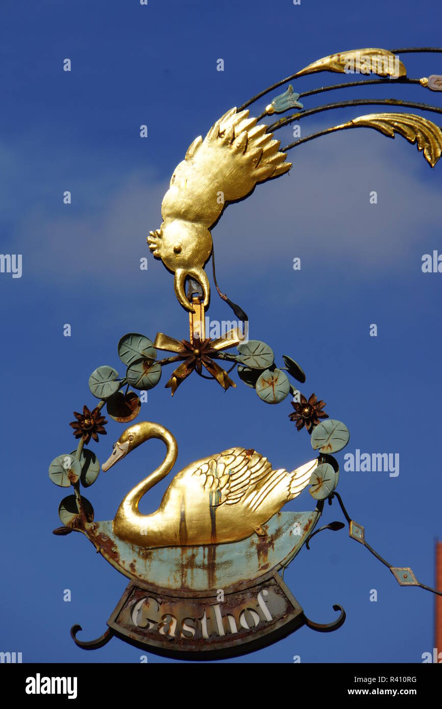 inn signboard in the historic old town Stock Photo - Alamy