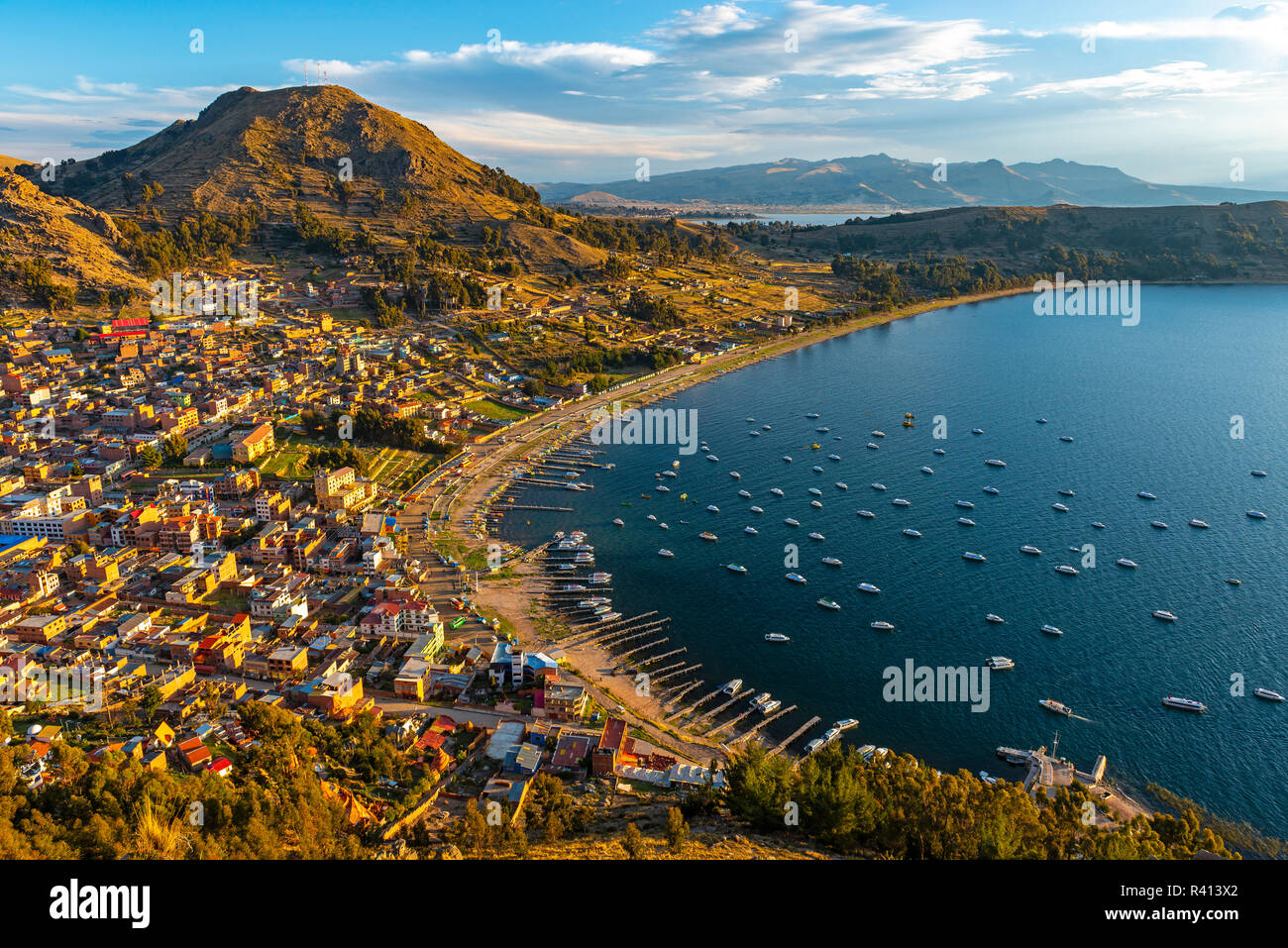 The cityscape of Copacabana city by the Titicaca Lake at sunset, Bolivia. Stock Photo