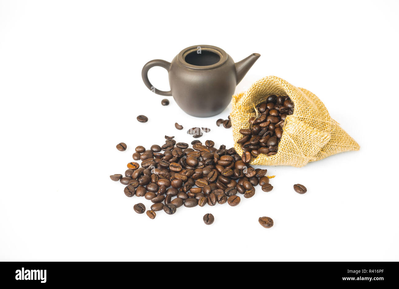 Coffee beans on a sack with Ancient pots on a white background Stock ...