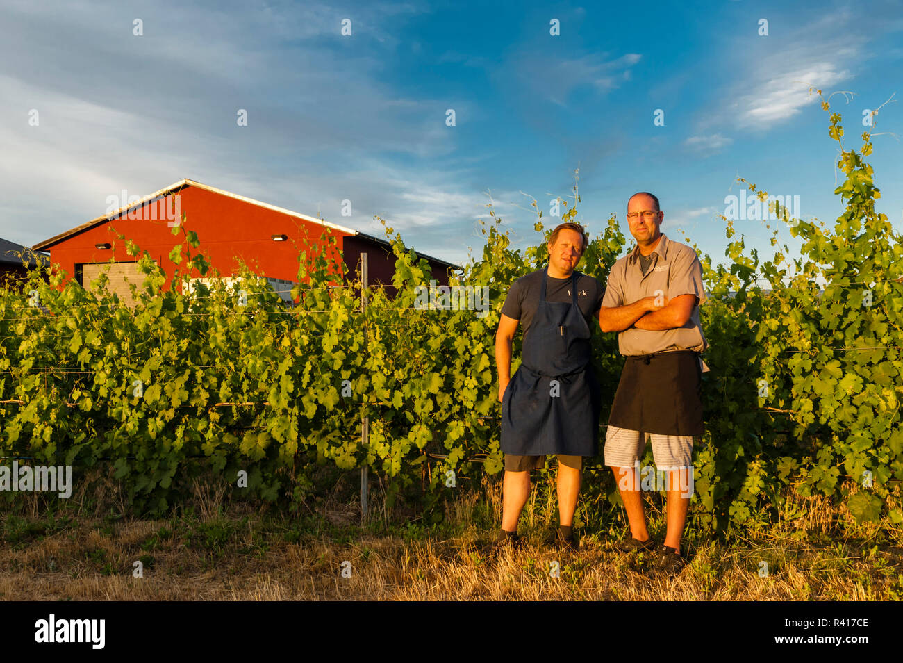 USA, Washington State, Walla Walla. Chefs John Sundstrom and Andrae Bopp at a wine event at Sleight of Hand Cellars. Stock Photo