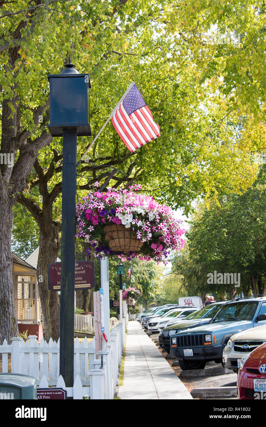 USA, Washington State, Kitsap Peninsula, Port Gamble. Picturesque tree lined street Stock Photo