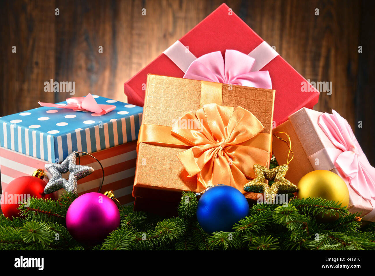 Colorful gift boxes and christmas tree Stock Photo