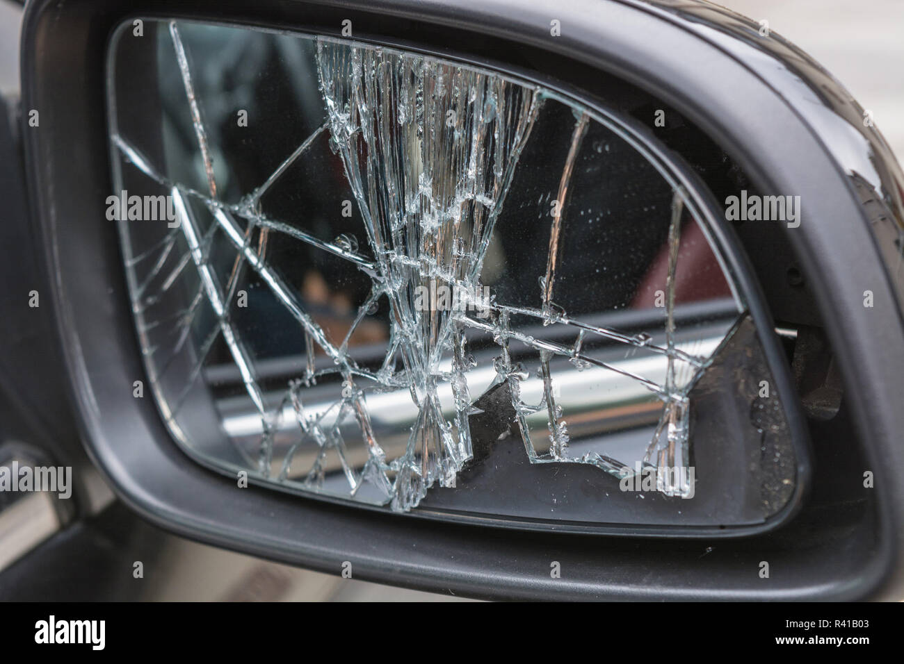 torn car side mirror Stock Photo