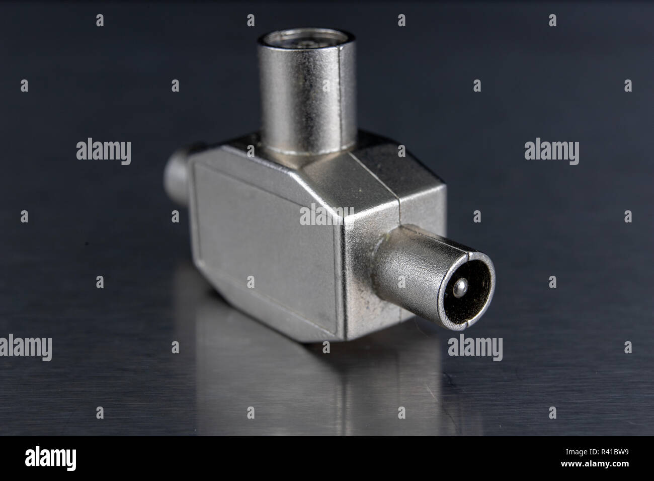 Antenna and television connectors on a metal table. Accessories for ...