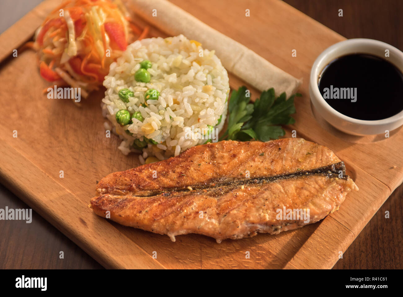 Grilled salmon with rice Stock Photo - Alamy