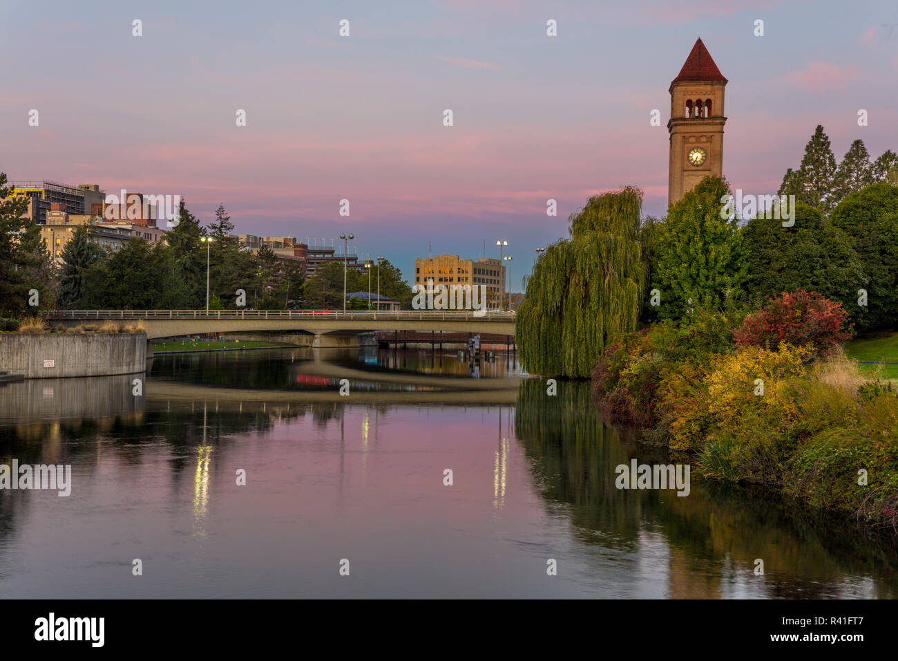 Clock tower reflects in the Spokane River at Riverfront Park in Spokane, Washington State, USA Stock Photo