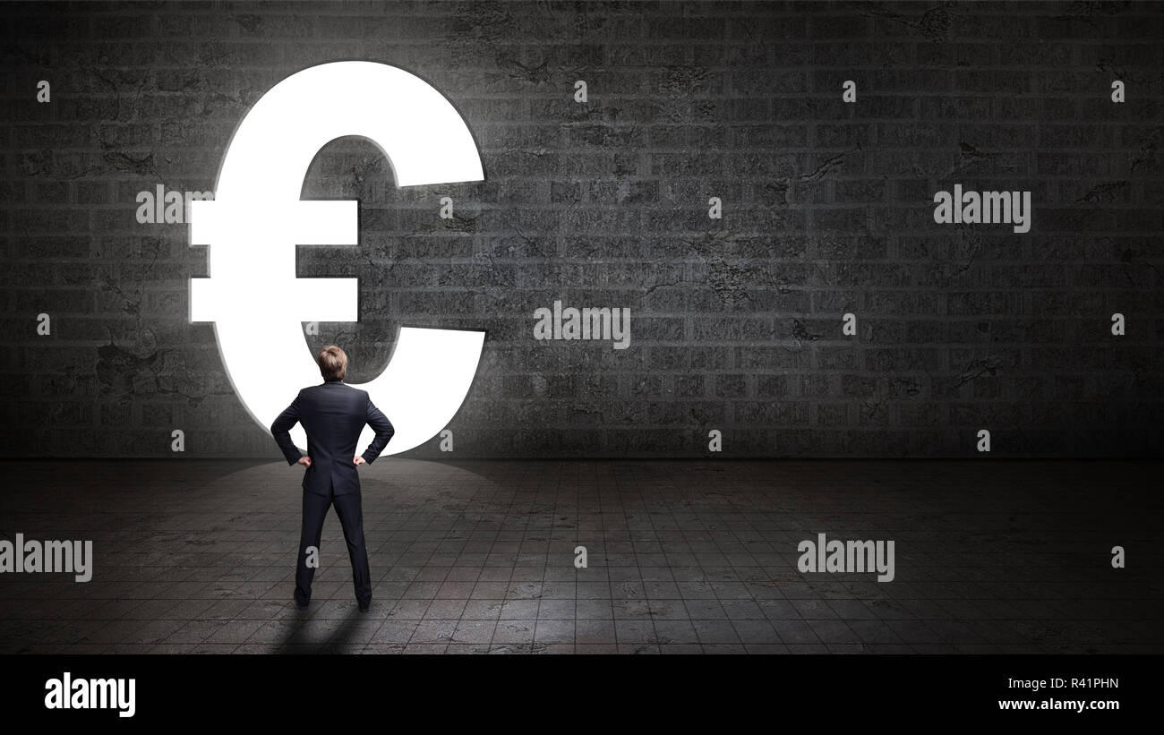 businessman standing in front of a portal shaped as a euro-symbol Stock Photo