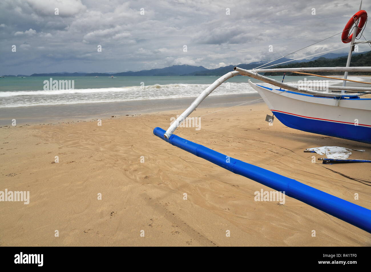 Fishing bangka boats stranded on the beach. Sabang-P.P.Subterranean River Nnal.Park-Palawan-Philippines-079 Stock Photo