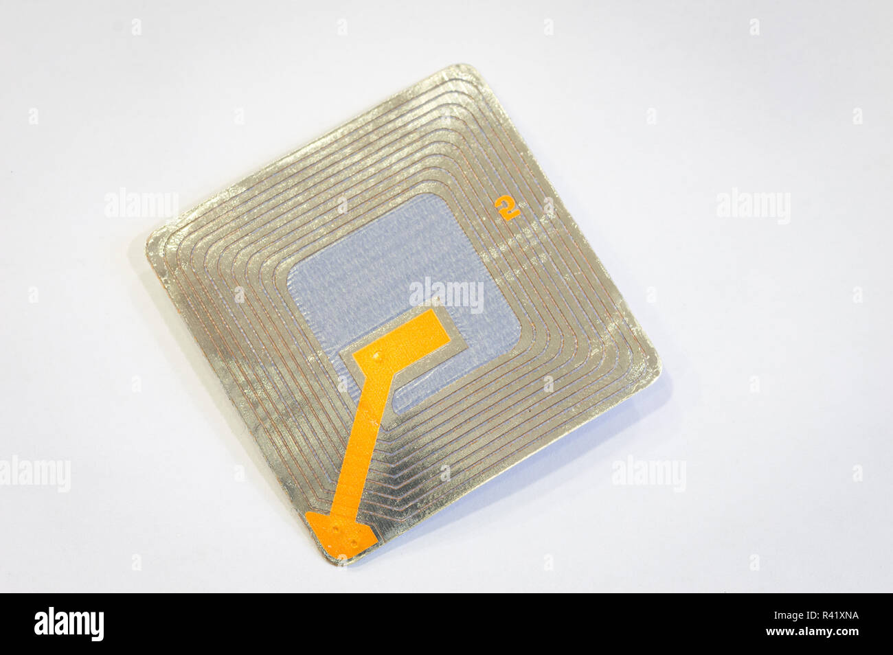 Close up of RFID tags used for tracking and identification purposes and as an anti-theft system in commerce and retail. Stock Photo