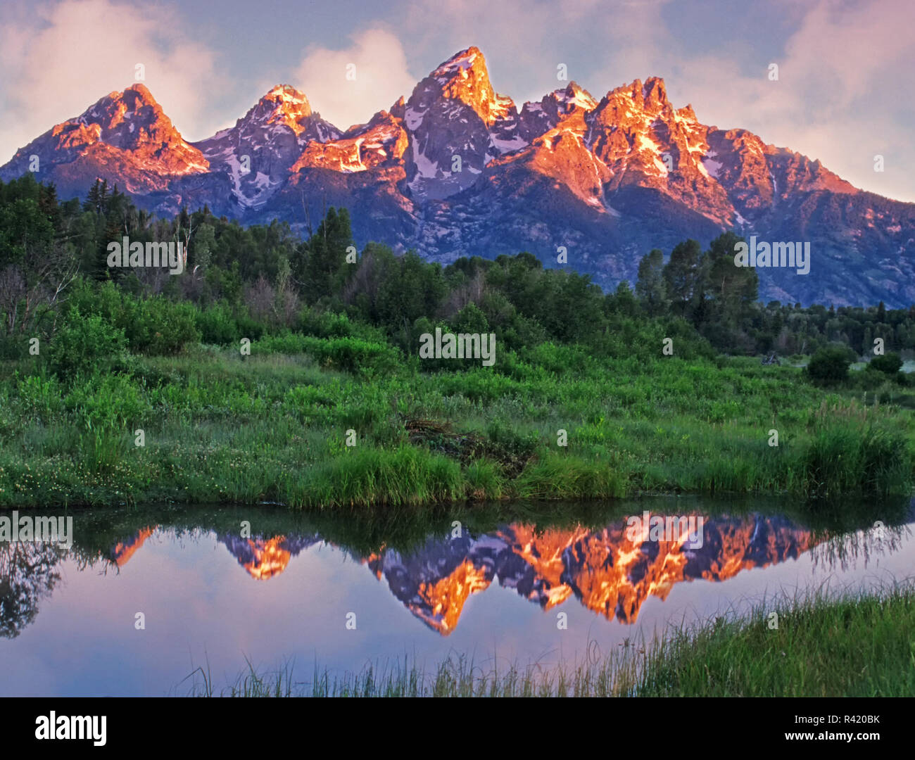USA, Wyoming, Grand Teton National Park. Grand Tetons reflect in Snake