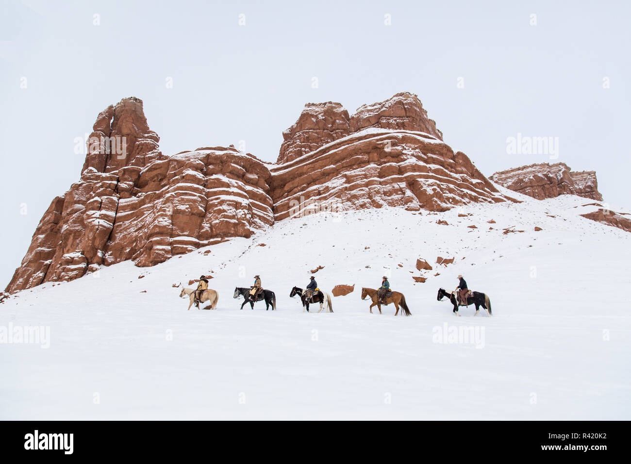 Cowhands Ranch Riding wintertime along base of redrock cowhands, Hideout Ranch, Shell ...