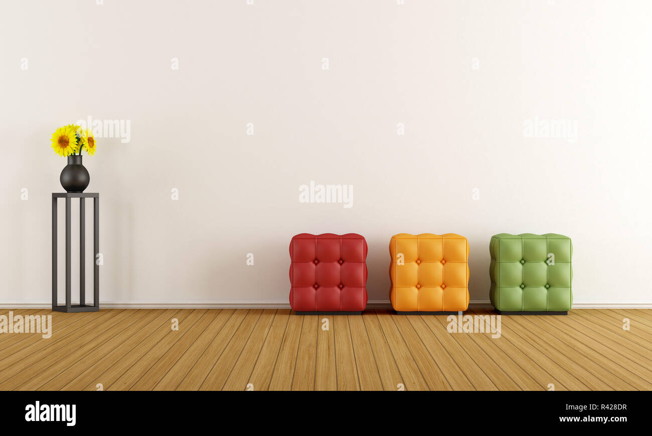 Minimalist white room with pouf Stock Photo - Alamy
