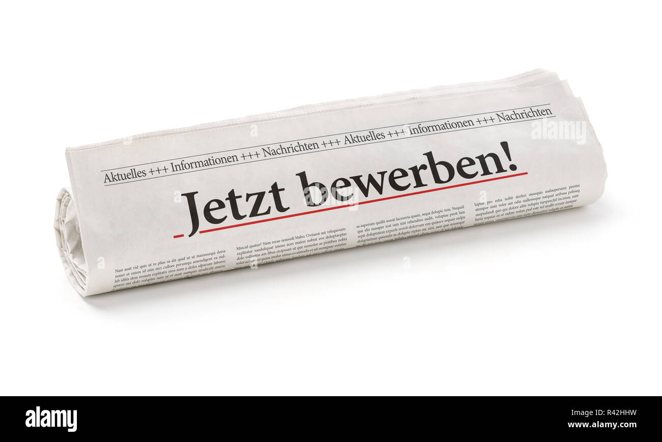 newspaper roll with the heading now apply Stock Photo
