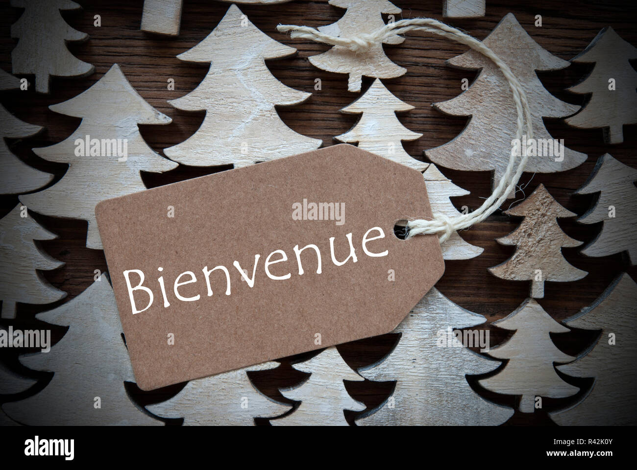 brown christmas label with bienvenue means welcome Stock Photo