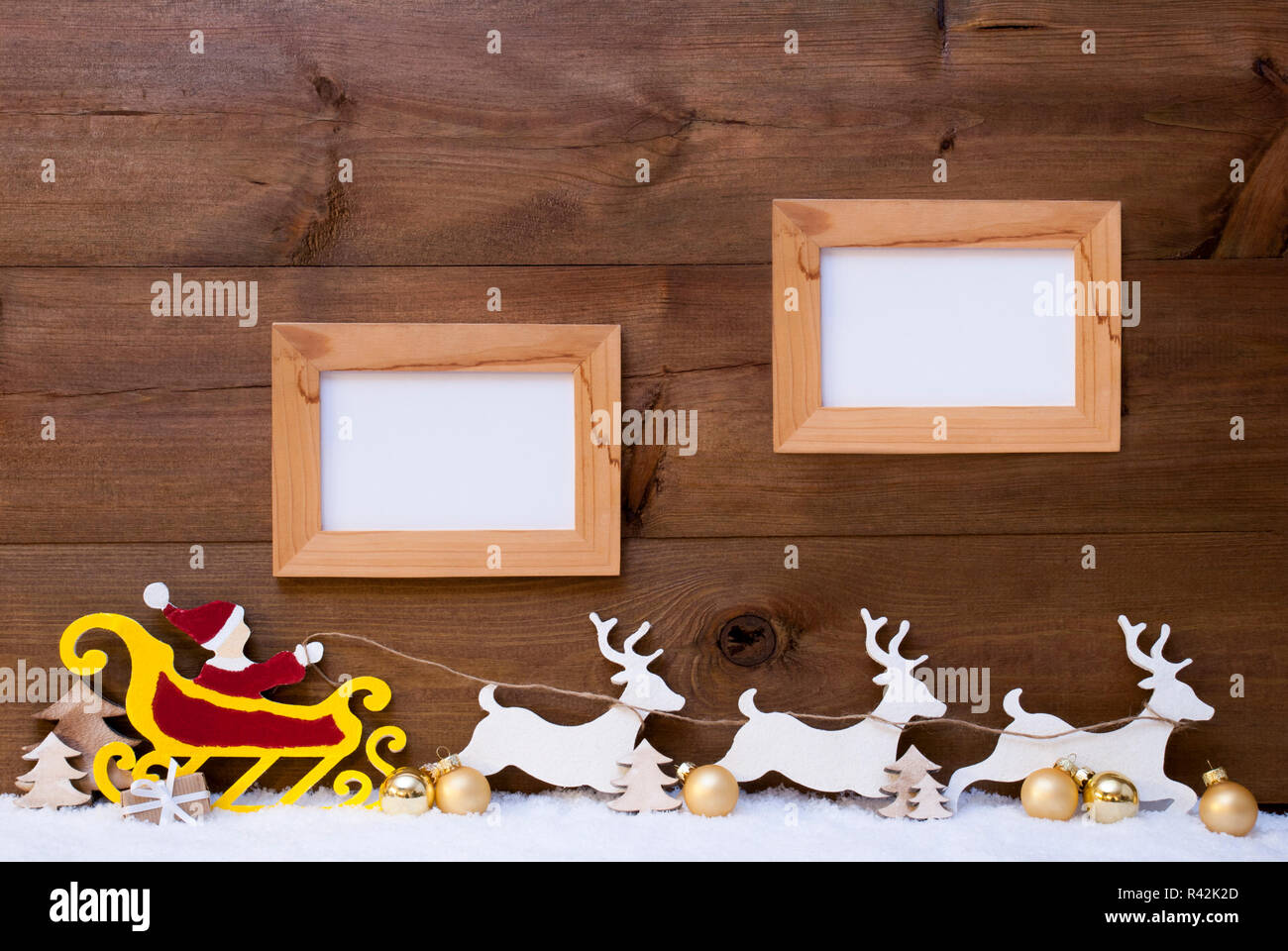 santa claus sled,reindeer,snow,copyspace,two frame Stock Photo