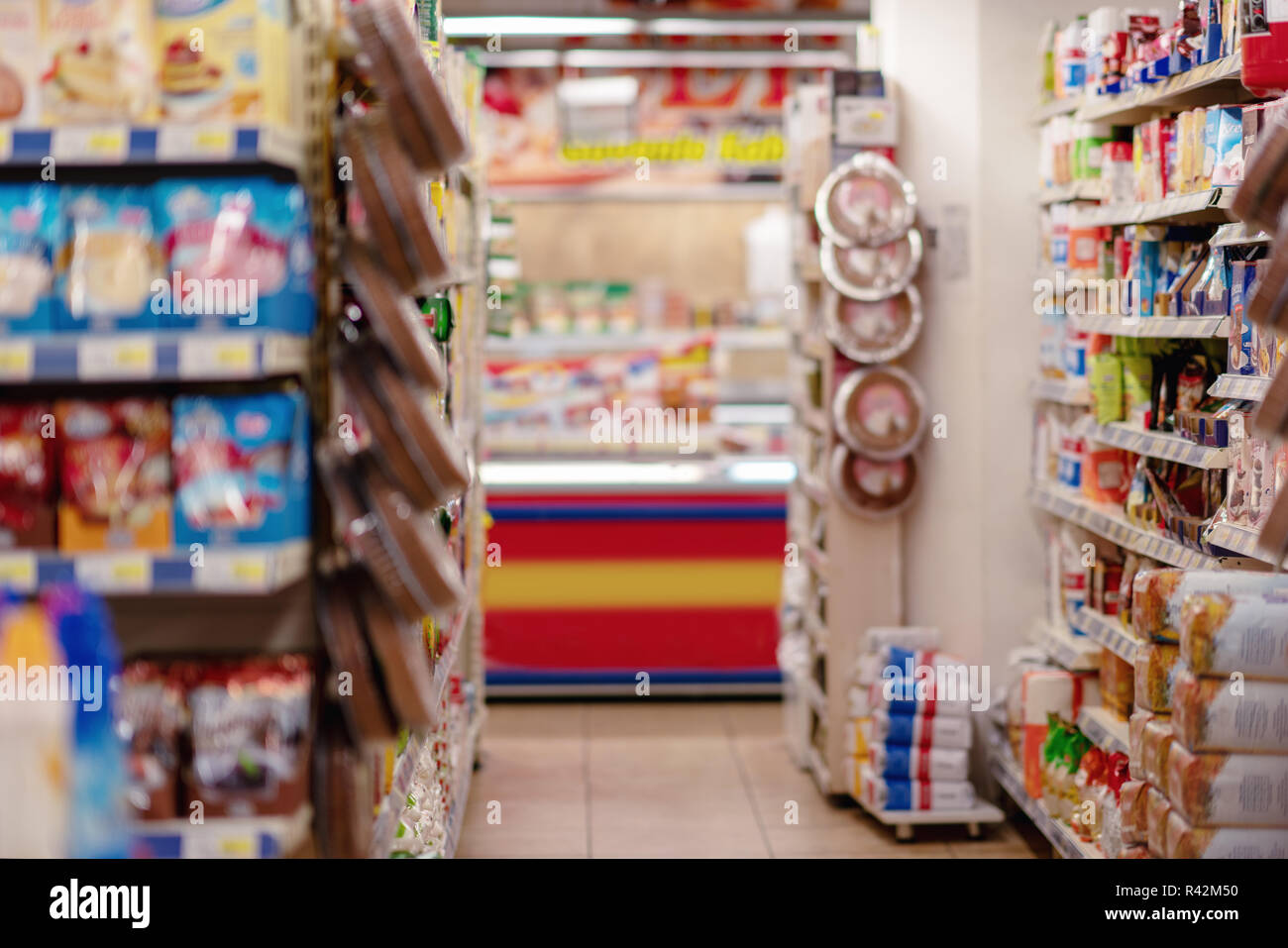 Supermarket blur background with bokeh, Miscellaneous Product shelf Stock Photo