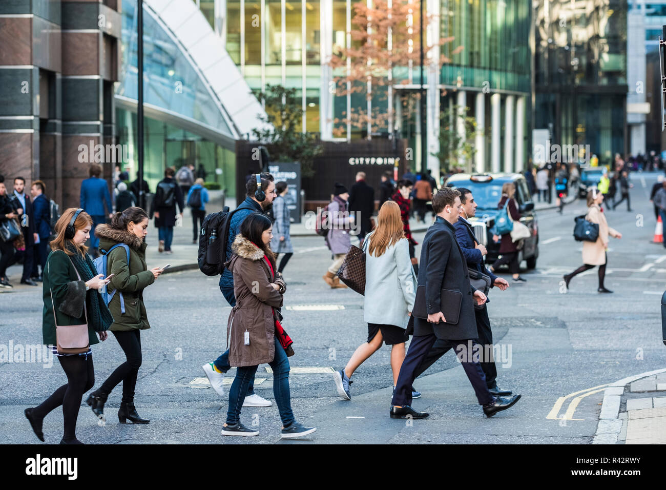 Morning commuters walk to work, London, England, U.K. Stock Photo
