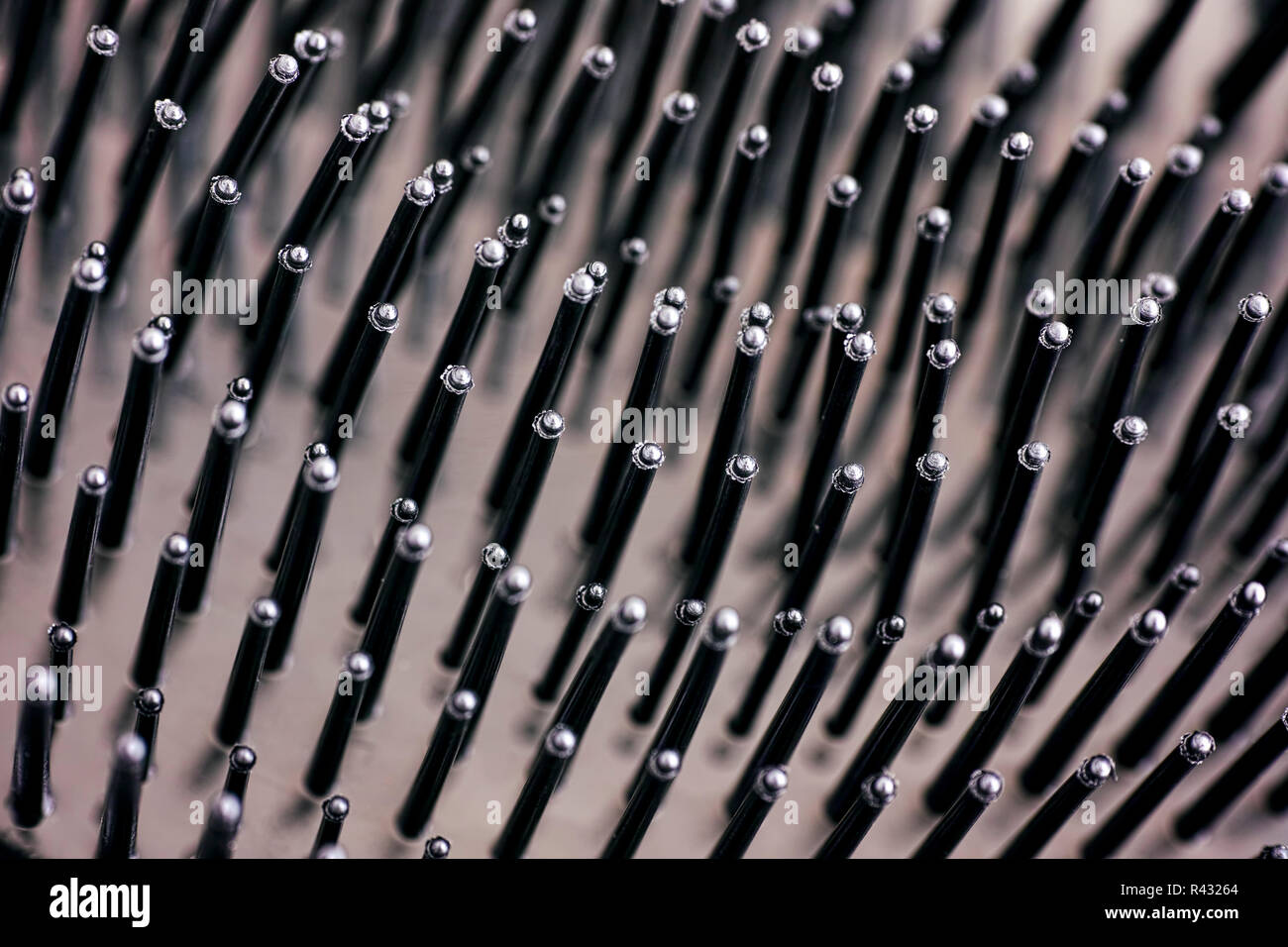 Close-up of bristles on black hairbrush. Full frame. Stock Photo
