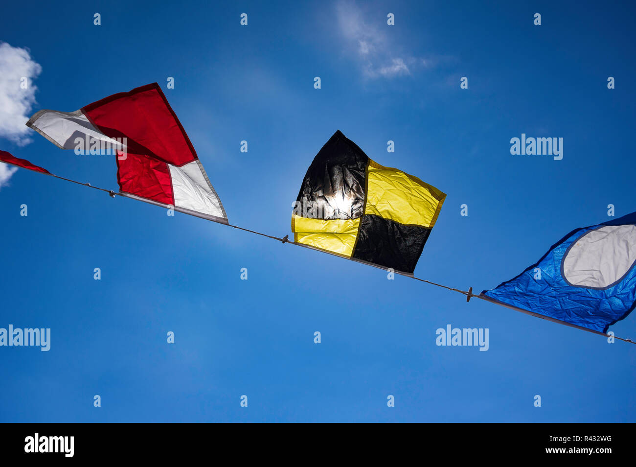 Various nautical flags at a marina in Victoria B.C. Stock Photo