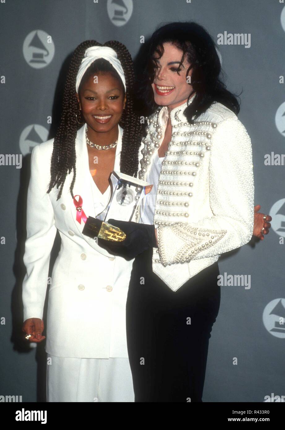 LOS ANGELES, CA - FEBRUARY 24: Singer Janet Jackson and brother singer Michael Jackson attend the 35th Annual Grammy Awards on February 24, 1993 at the Shrine Auditorium in Los Angeles, California. Photo by Barry King/Alamy Stock Photo Stock Photo