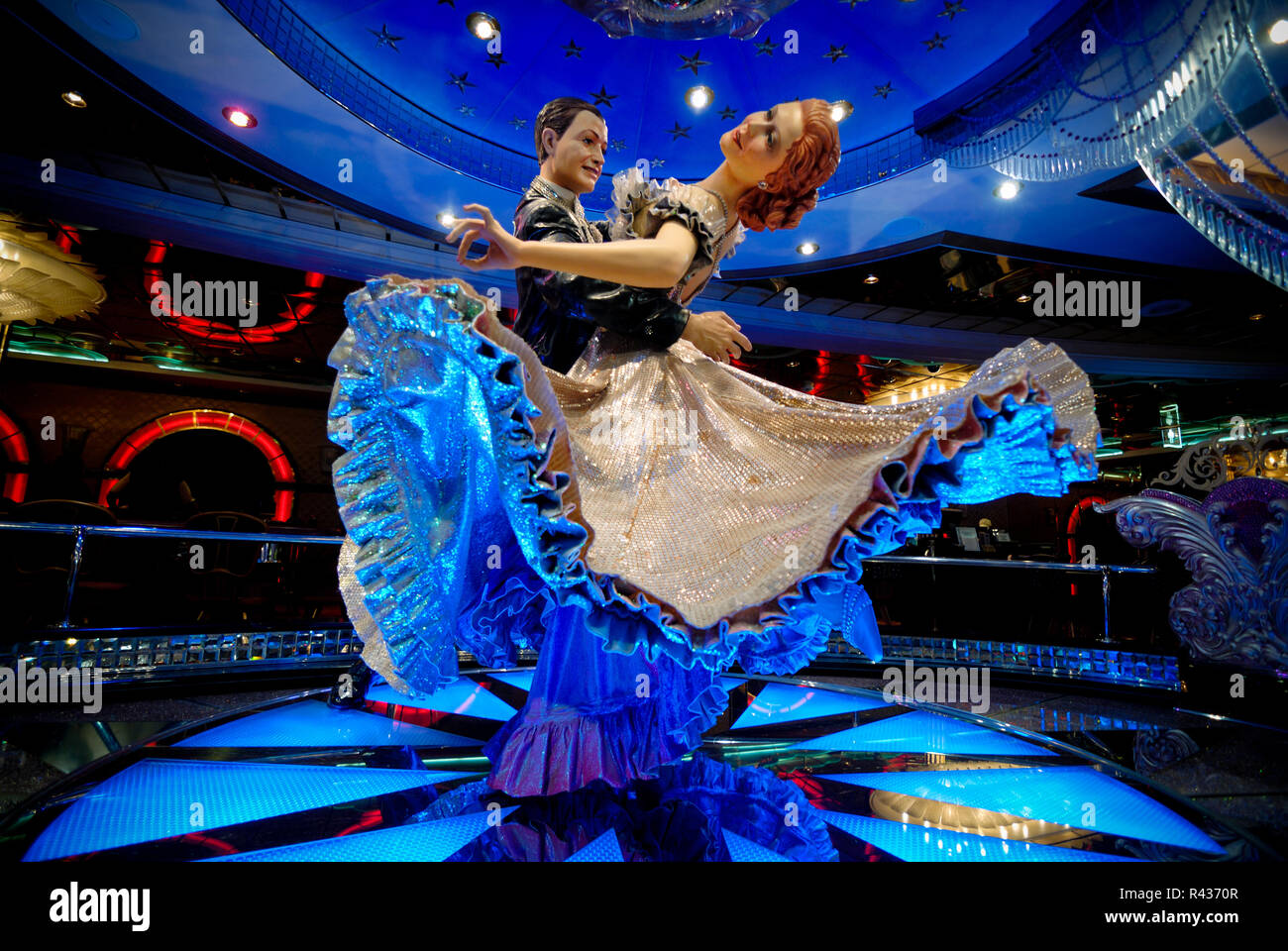 This statue of two ballroom dancers is located in the casino on the Royal Caribbean cruise ship Adventure of the Seas. Stock Photo
