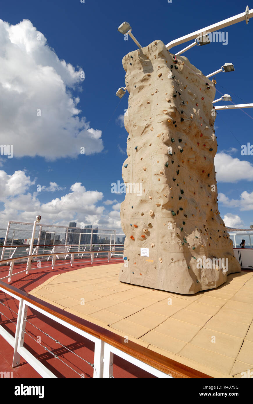 The rock climbing wall on the upper level sports deck of the Majesty of