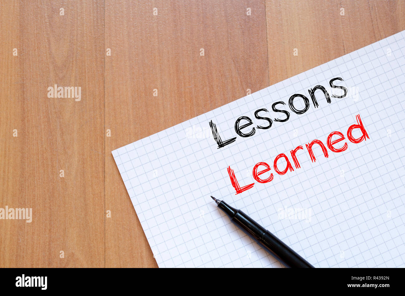 Lessons learned write on notebook Stock Photo - Alamy