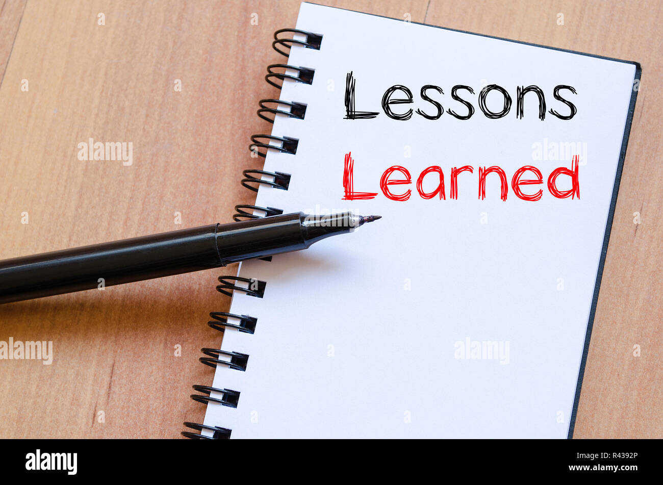 Lessons learned write on notebook Stock Photo - Alamy