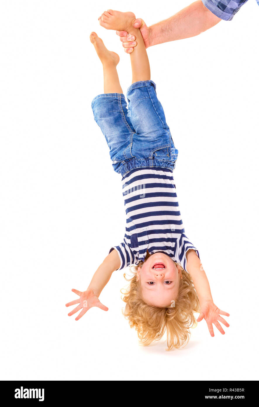 Little boy upside down Stock Photo Alamy