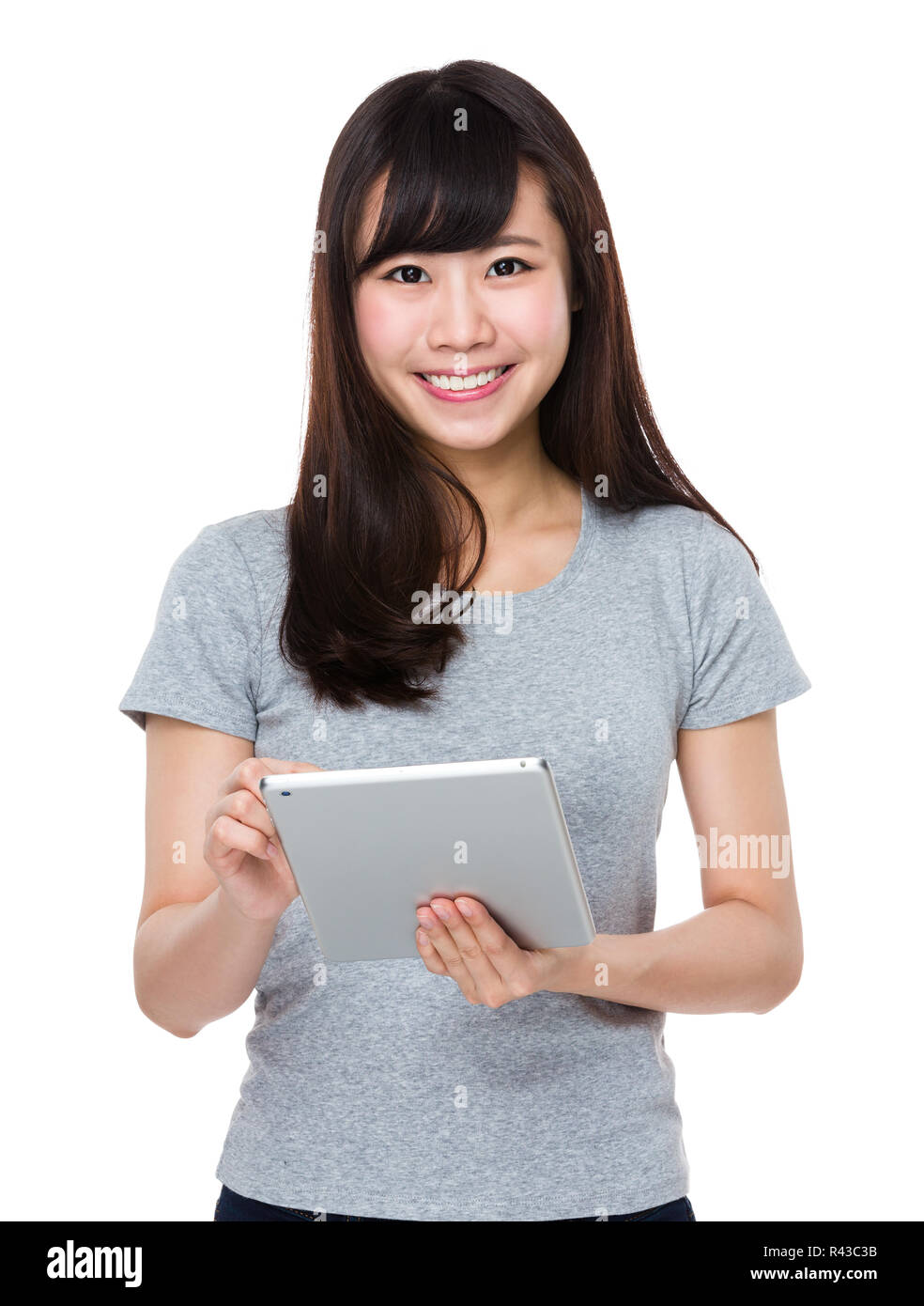 Asian woman use of the tablet pc Stock Photo - Alamy