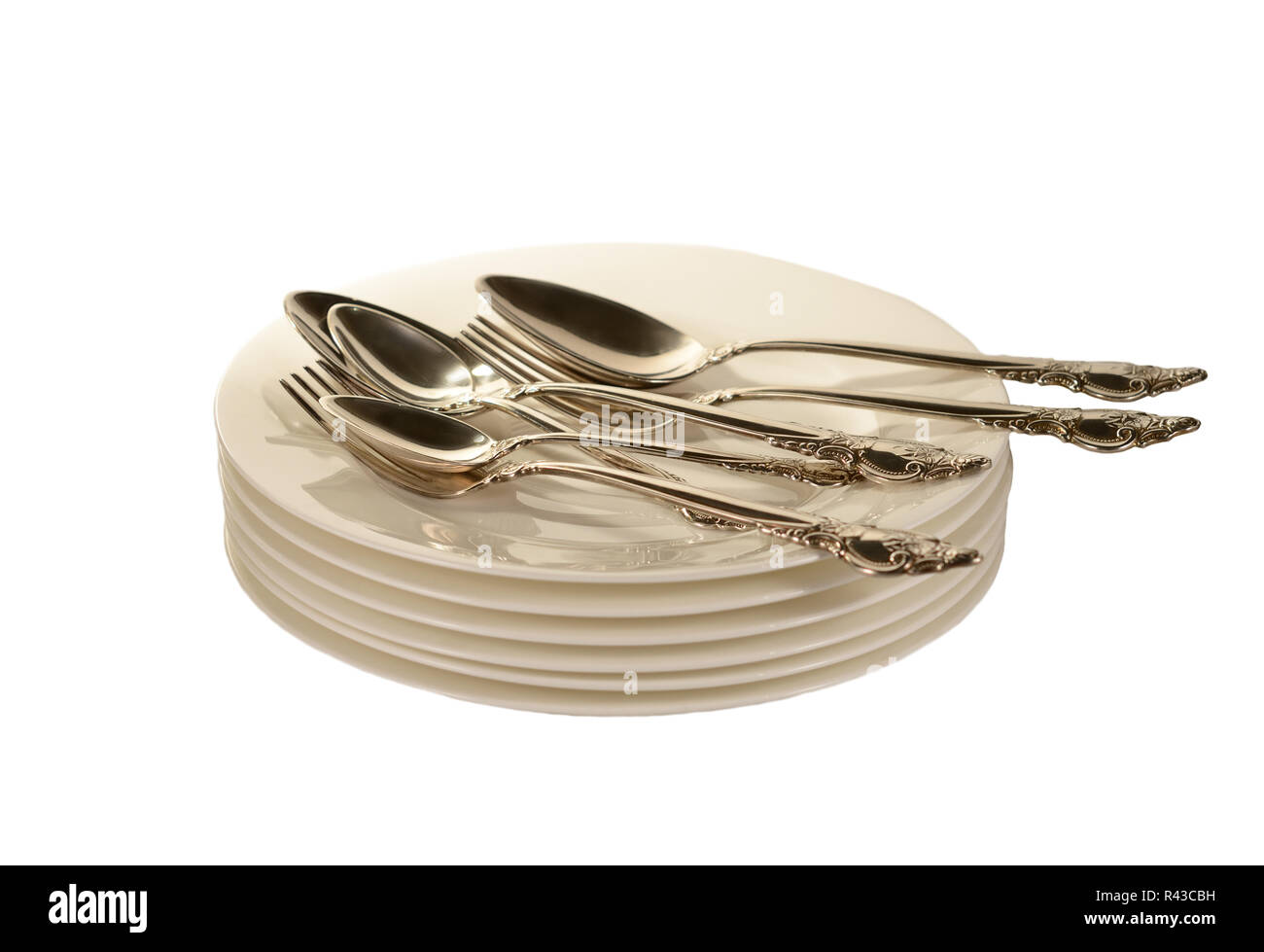 Silverware on plates Stock Photo Alamy