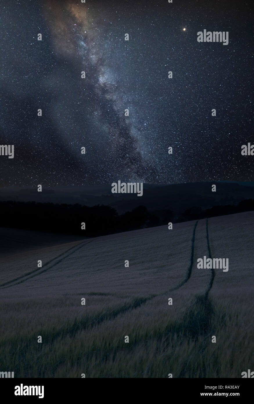 Stunning vibrant Milky Way composite image over landscape of Summer ...