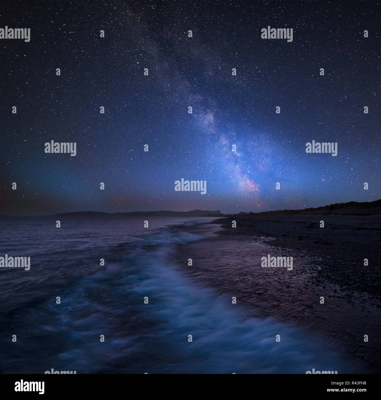 Stunning vibrant Milky Way composite image over landscape of West coast ...