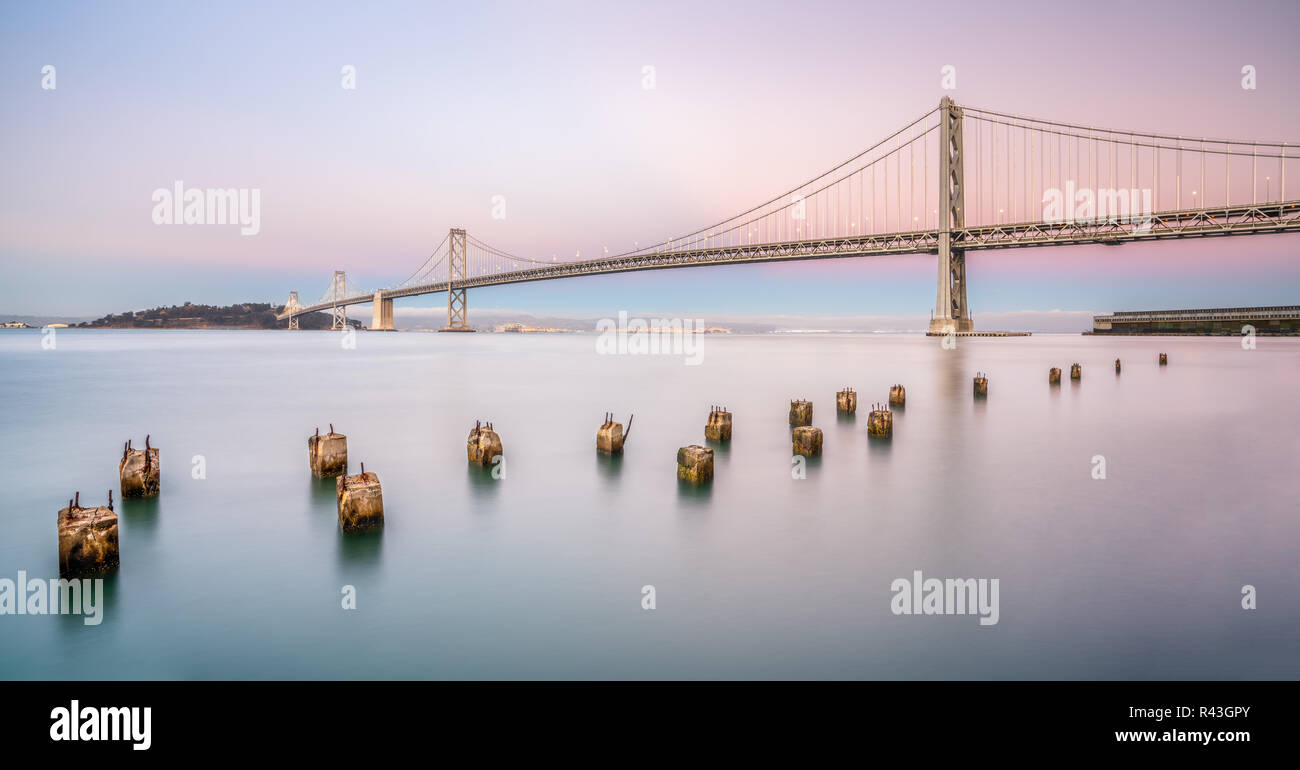 Bay Bridge is located in California, US, and connects San Francisco and Oakland. Its construction finished in 1936 and is one of the main landmarks of Stock Photo