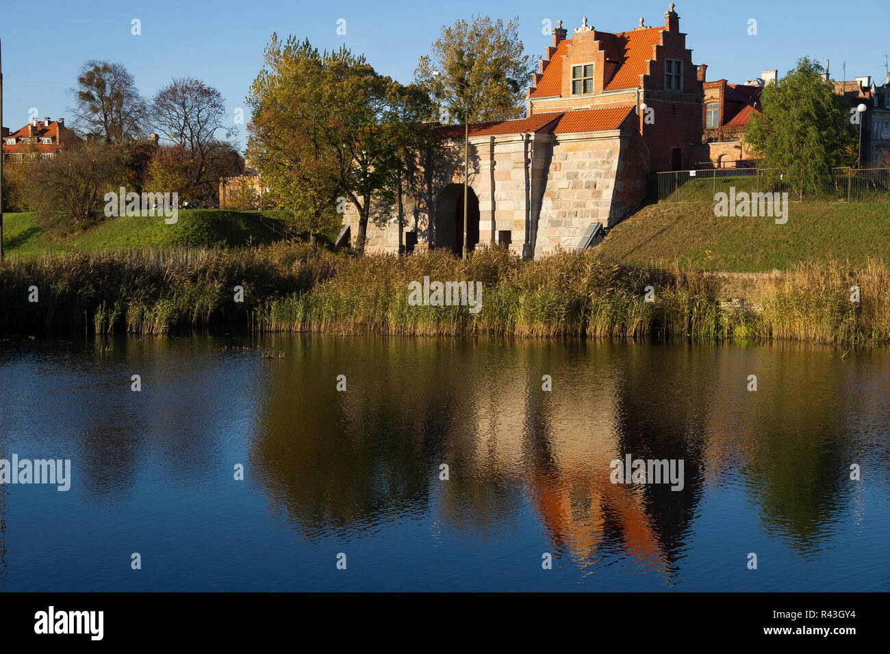 Renaissance Brama Nizinna (Lowland Gate) built by Jan Strakowski in XVII century is a part of early modern era fortifications of Gdansk, in Lower City Stock Photo